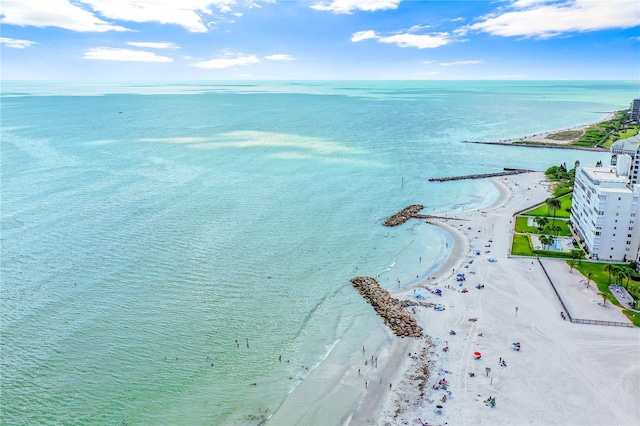 birds eye view of property featuring a view of the beach and a water view