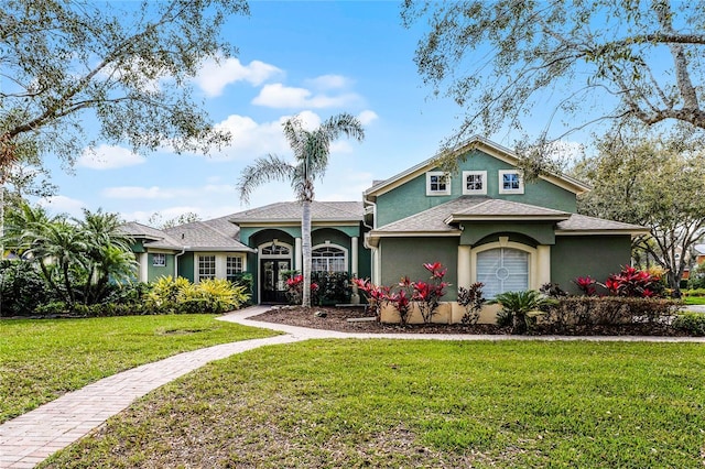 701 Palenci Ct, Winter Springs, FL 32708 - view of front of house featuring stucco siding and a front yard