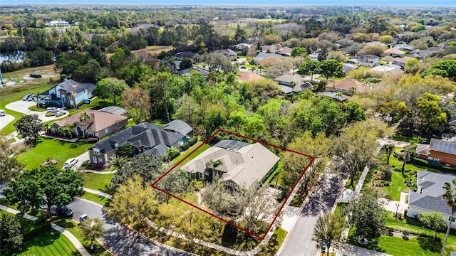 bird's eye view featuring a residential view and a view of trees