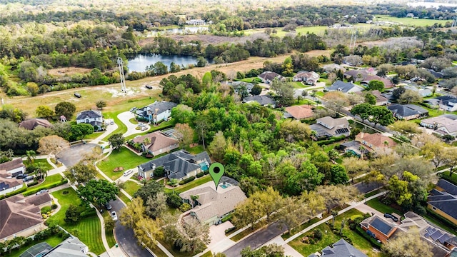 bird's eye view with a residential view and a water view