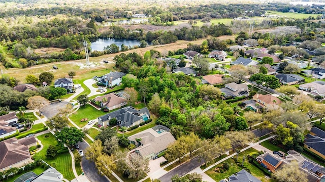 birds eye view of property featuring a residential view and a water view