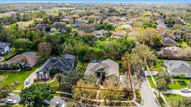 birds eye view of property with a residential view