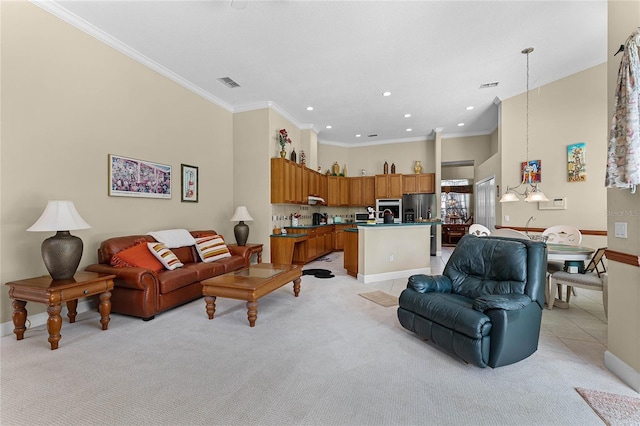 living area with visible vents, light colored carpet, a high ceiling, and crown molding