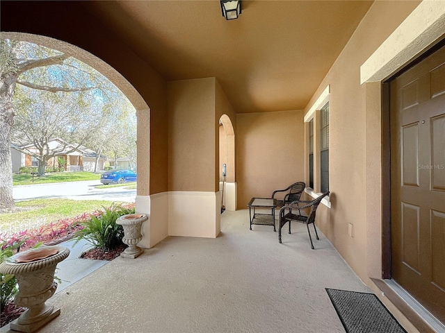 view of patio featuring covered porch