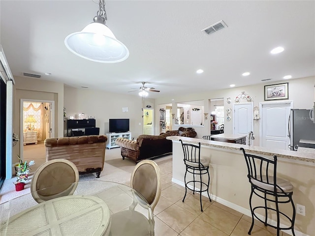 dining area featuring recessed lighting, visible vents, a ceiling fan, and light tile patterned flooring