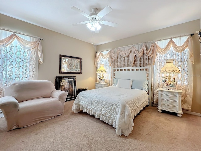 bedroom featuring carpet and ceiling fan