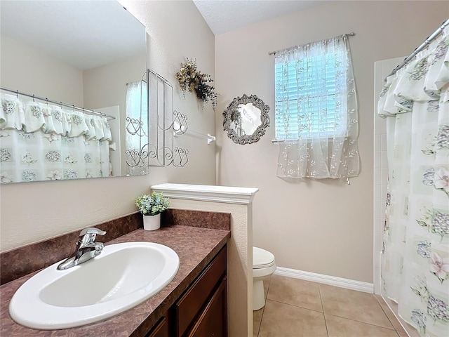 full bathroom featuring curtained shower, toilet, vanity, tile patterned flooring, and baseboards