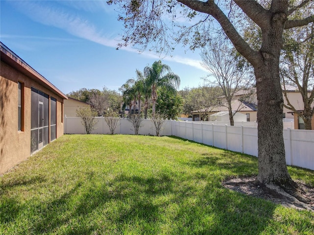 view of yard featuring a fenced backyard