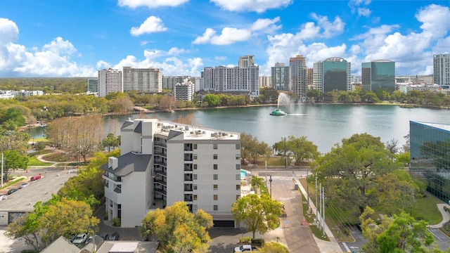 drone / aerial view with a water view and a city view