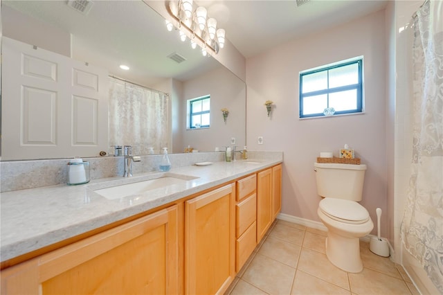 full bath featuring tile patterned floors, toilet, visible vents, and a sink