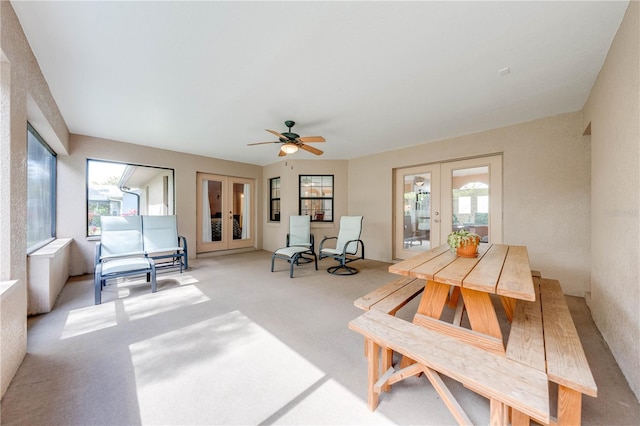 sunroom featuring french doors