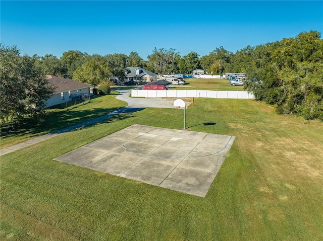 view of yard featuring community basketball court