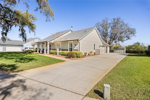 view of front of home with a garage and a front yard