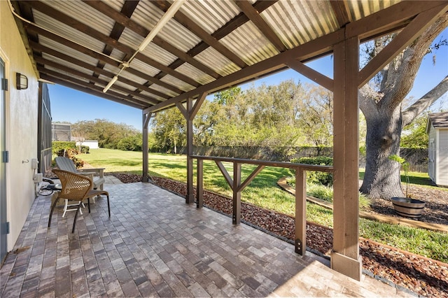 view of patio / terrace featuring fence