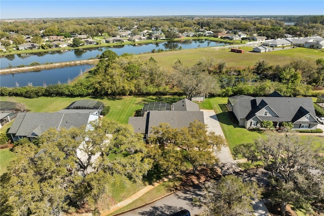 aerial view with a residential view and a water view