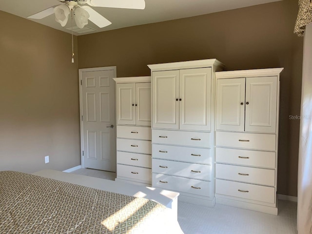 unfurnished bedroom featuring baseboards and a ceiling fan