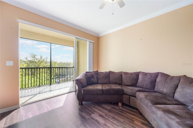 living area with baseboards, dark wood-type flooring, a ceiling fan, and crown molding