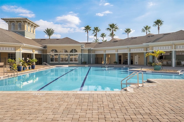 community pool with a patio area