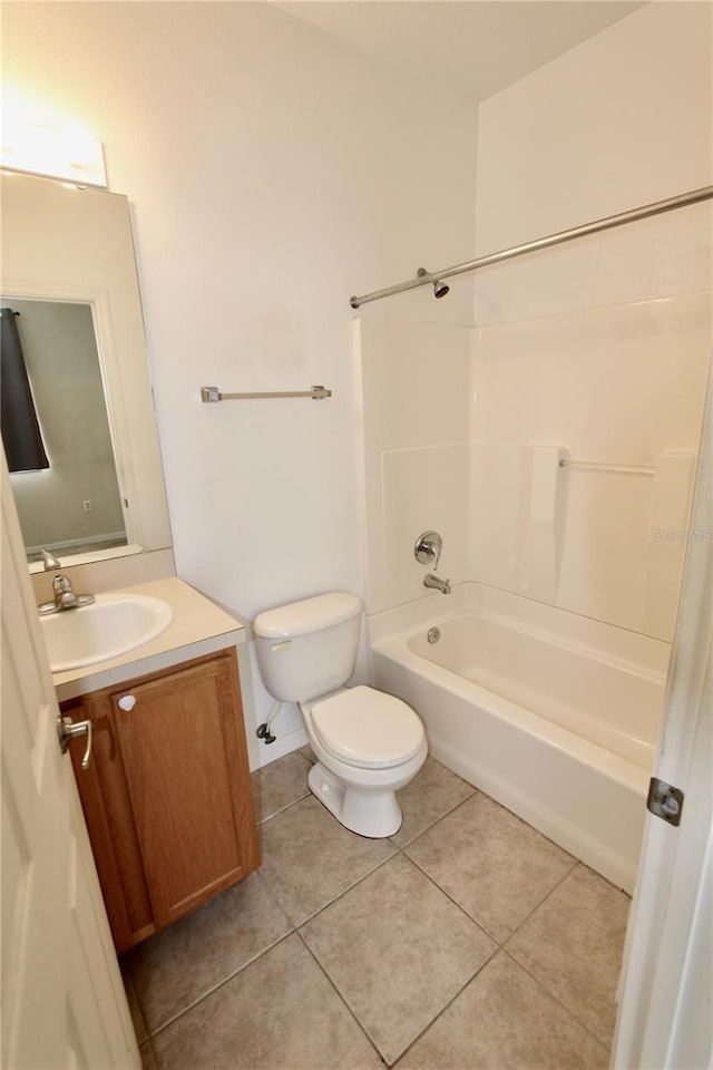 full bathroom with toilet, tile patterned flooring, shower / tub combination, and vanity