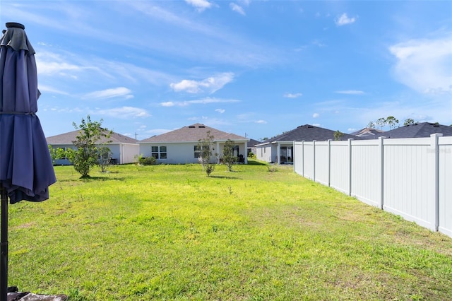 view of yard with fence