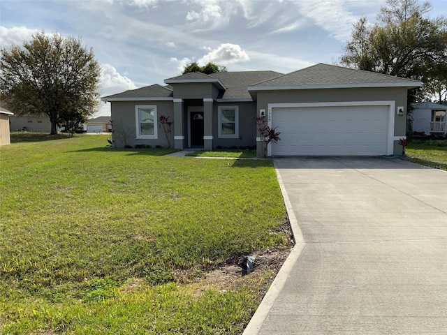 view of front of house with a front lawn, concrete driveway, an attached garage, and stucco siding