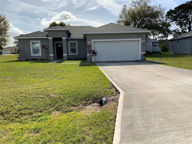 view of front of home featuring a front lawn, an attached garage, and stucco siding