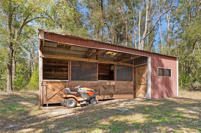 view of outbuilding featuring an outdoor structure