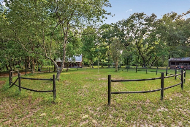 view of yard with fence