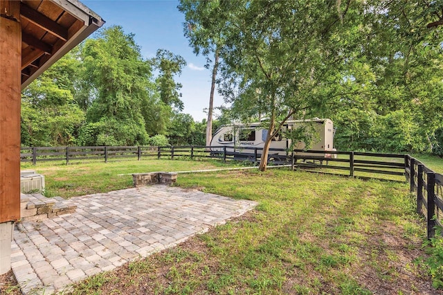 view of yard with a patio and a fenced backyard