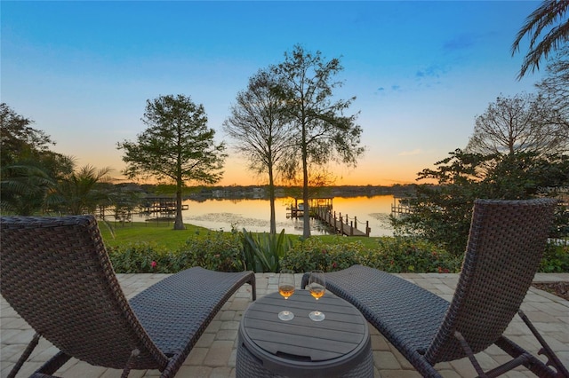 view of patio featuring a water view