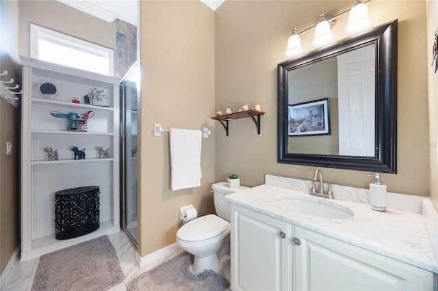 full bathroom with toilet, marble finish floor, a shower stall, baseboards, and vanity