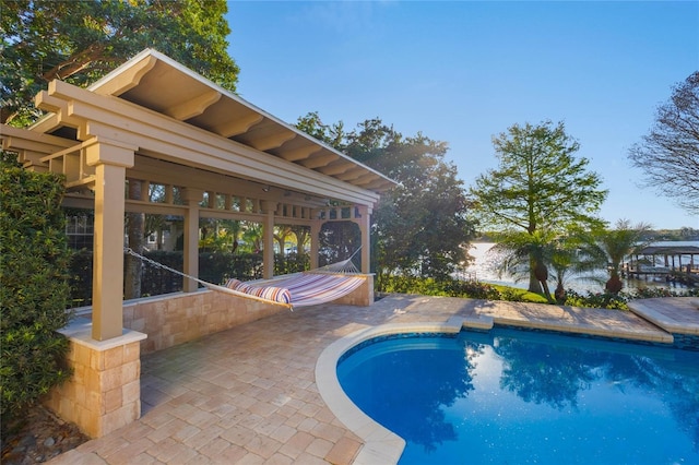 outdoor pool with a patio