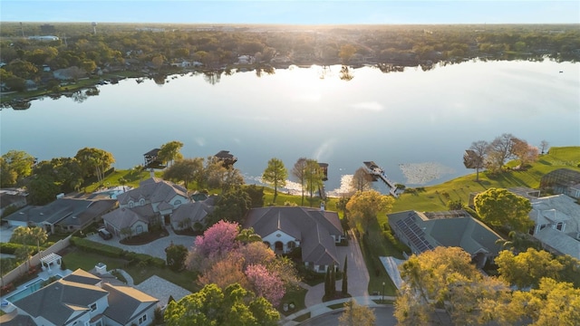 aerial view with a residential view and a water view