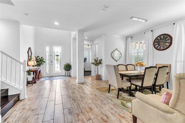 entrance foyer with visible vents, stairs, recessed lighting, baseboards, and wood tiled floor