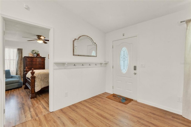 foyer featuring light wood-style floors and ceiling fan