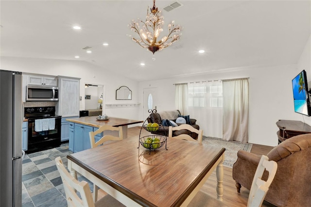 dining area with lofted ceiling, visible vents, a notable chandelier, and recessed lighting