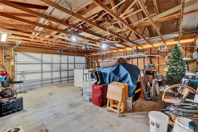 garage featuring a garage door opener