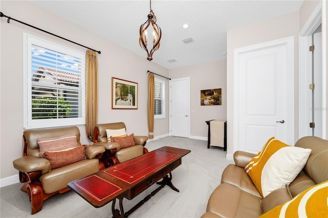 living area featuring recessed lighting, light carpet, visible vents, and baseboards