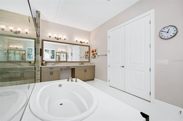 bathroom with a garden tub, a shower stall, and vanity