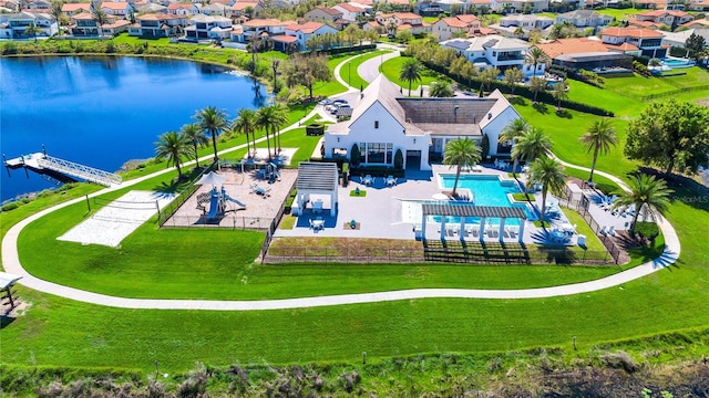 aerial view with a water view and a residential view