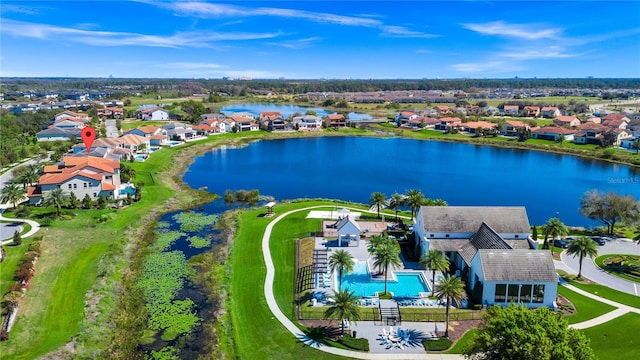 aerial view with a water view and a residential view