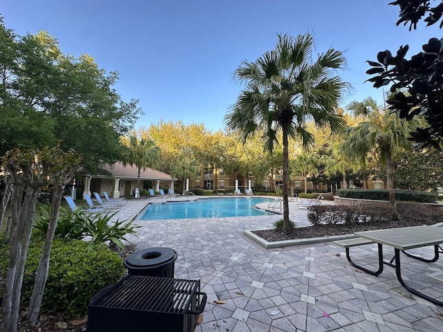 pool with a patio area