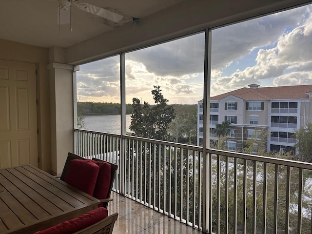 sunroom with a water view