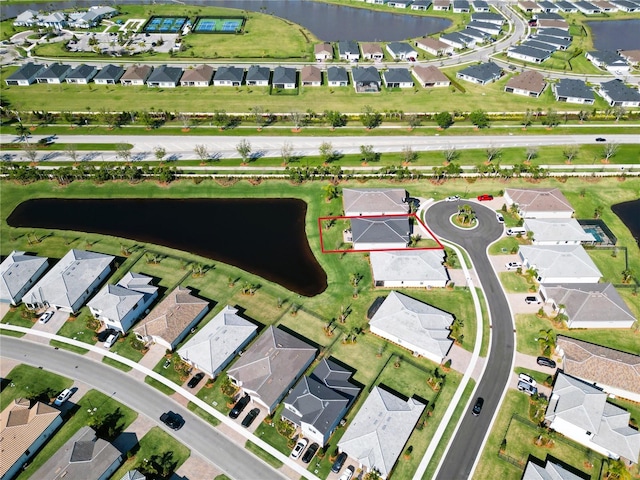 aerial view featuring a water view and a residential view