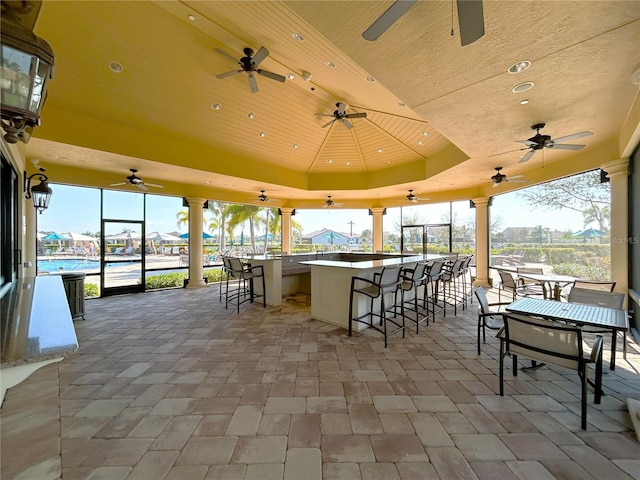 view of patio with outdoor dry bar