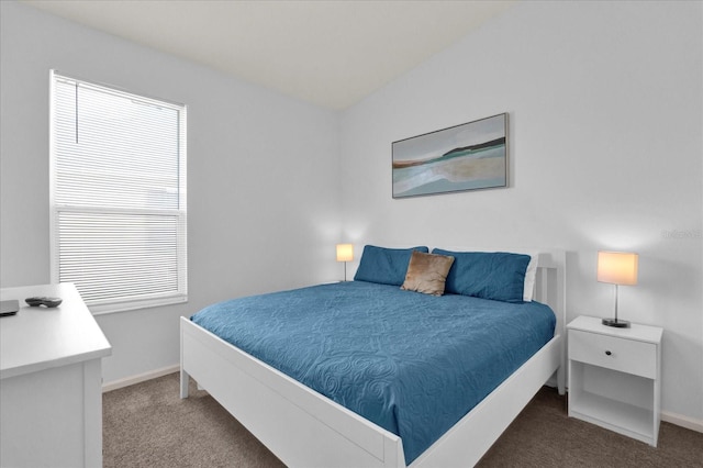 bedroom featuring baseboards and carpet flooring