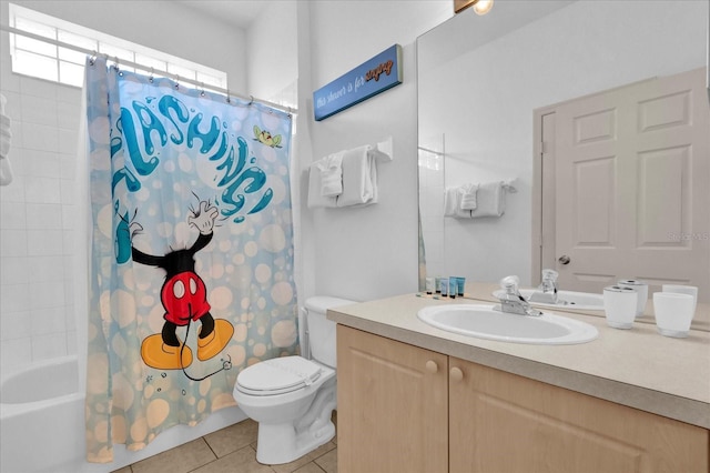 full bathroom with shower / bath combination with curtain, vanity, toilet, and tile patterned floors