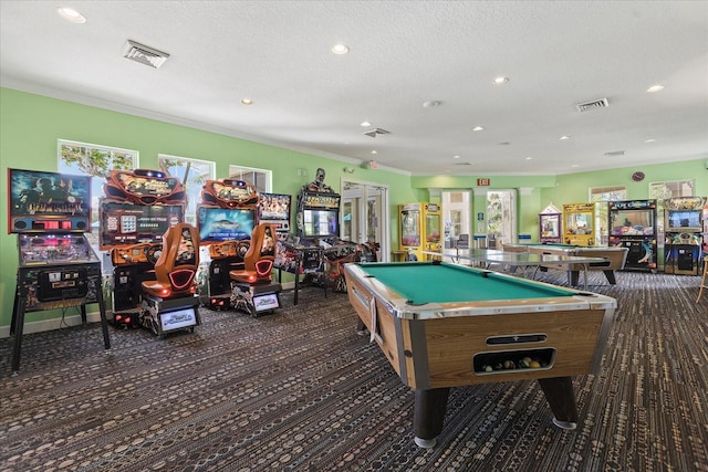 rec room featuring pool table, visible vents, crown molding, and a textured ceiling