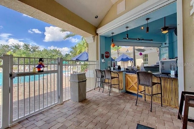 view of patio featuring visible vents and a bar