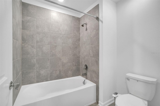 full bathroom with bathing tub / shower combination and toilet